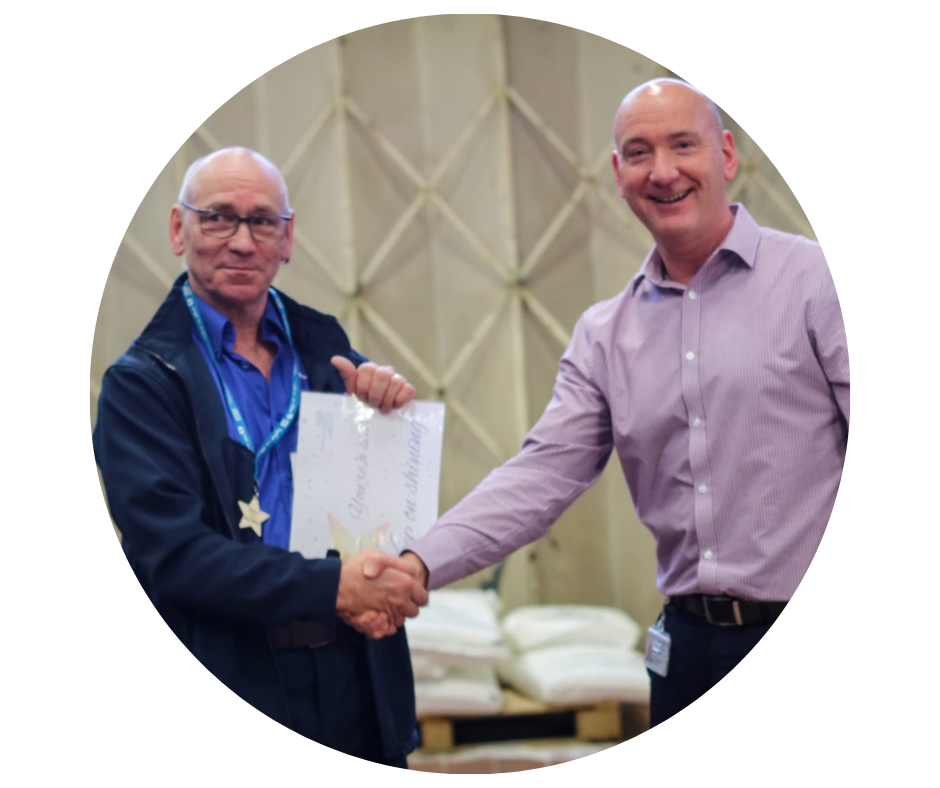 Stars of 2022: Maintenance Assistant Billy Hamilton receiving his award from Deputy Director of Estates and Facilities, Simon Tighe