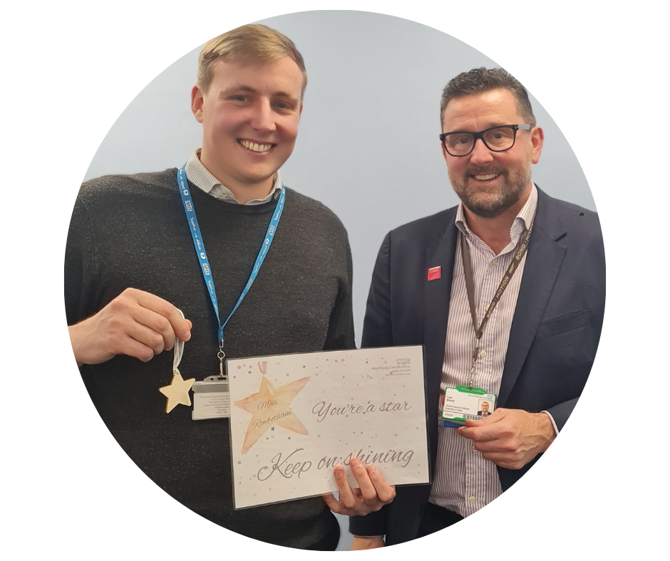 Stars of 2022: Accounts Assistant Max Rowbotham receiving his award from Chief Financial Officer Lee Bond.