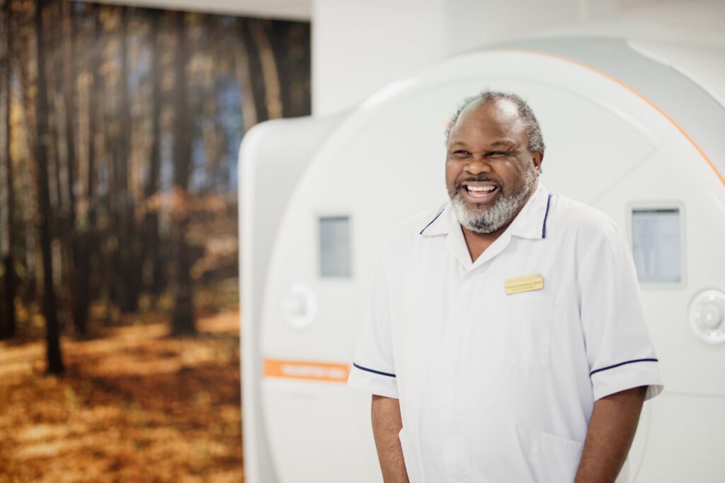 A member of staff smiles in one of our diagnostic units