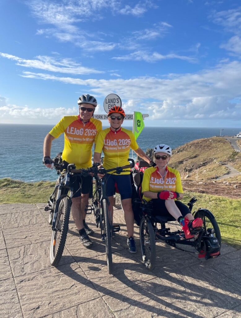 Adrian, Sarah and Jacquie on their bikes and trike at the start of their challenge