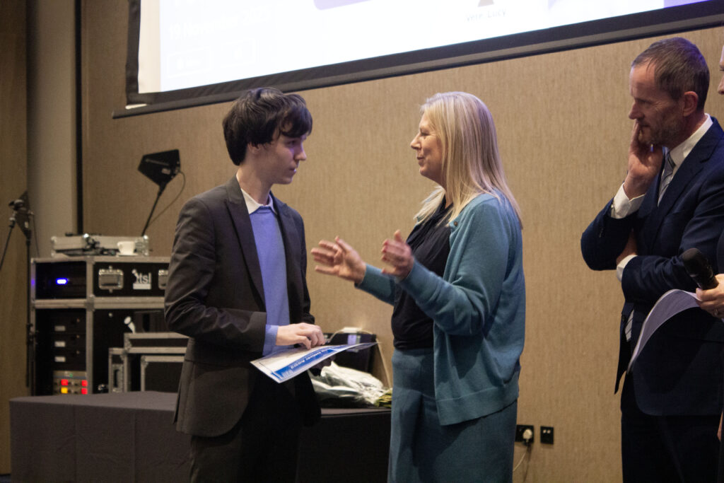 Harry receives his award from Victoria Bagshaw at the Nursing Conference in Hull