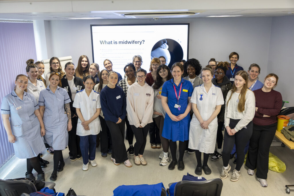 Staff pose with students attending the first "Springboard to Midwifery" event at Hull Royal Infirmary