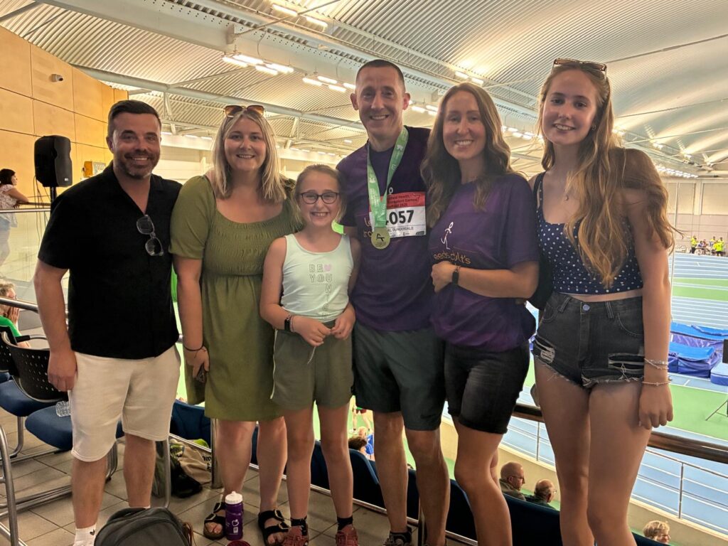 Transplant recipient Carl Dunderdale celebrates with his friend Andrew 'Rewy' Hensby and their families at the Transplant Games