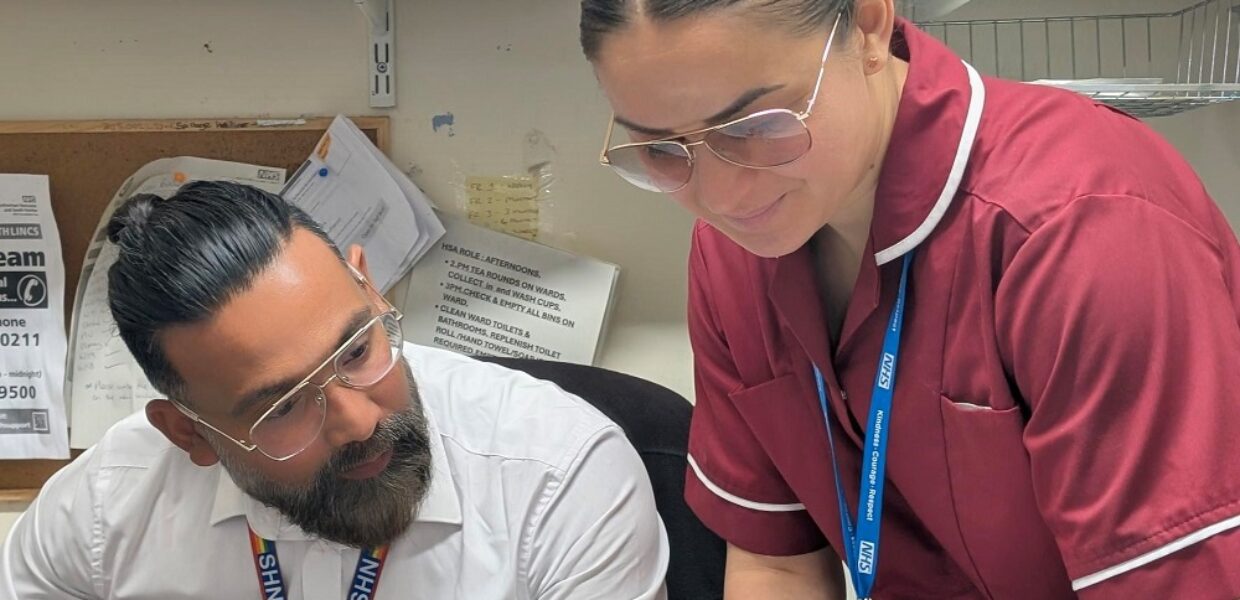 Anda chats through the day's tasks with one of her colleagues