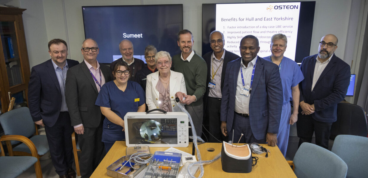 Ruth Knowles, centre in white jacket, with members of the neurosciences team