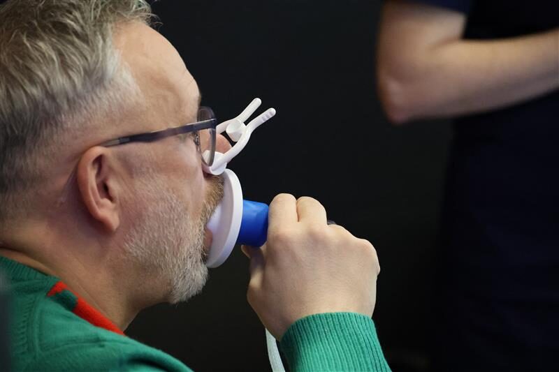 Teacher Paul Smith from Ron Dearing UTC tries out the spirometry test