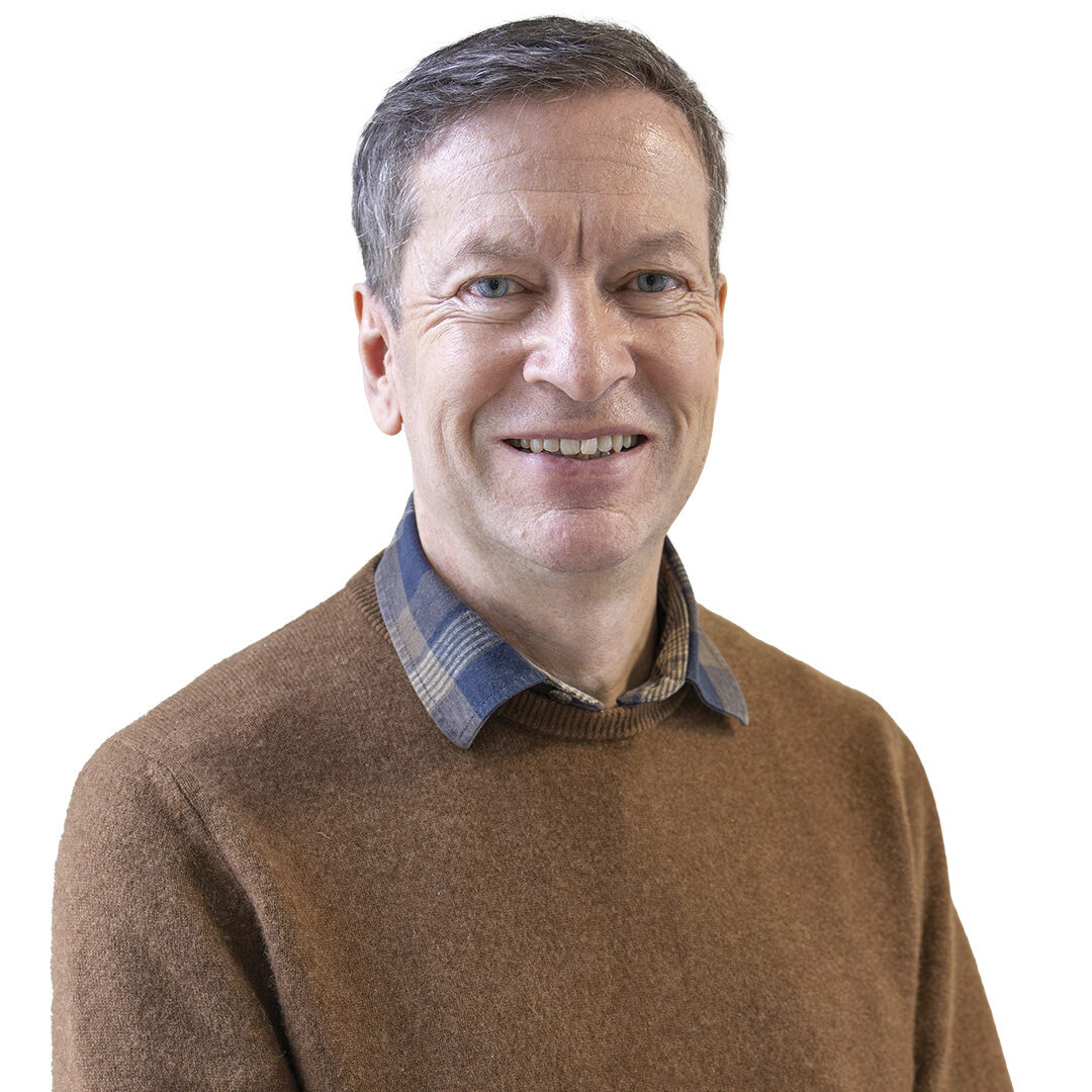 Head and shoulders image of Alan Downey wearing a brown jumper