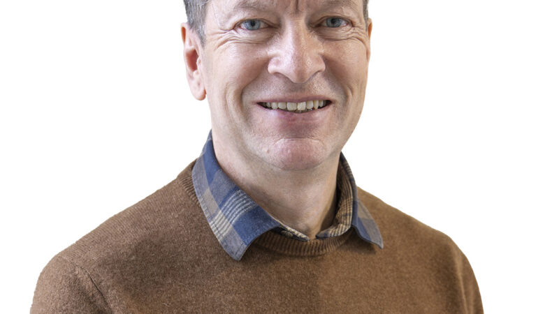 Head and shoulders image of Alan Downey wearing a brown jumper