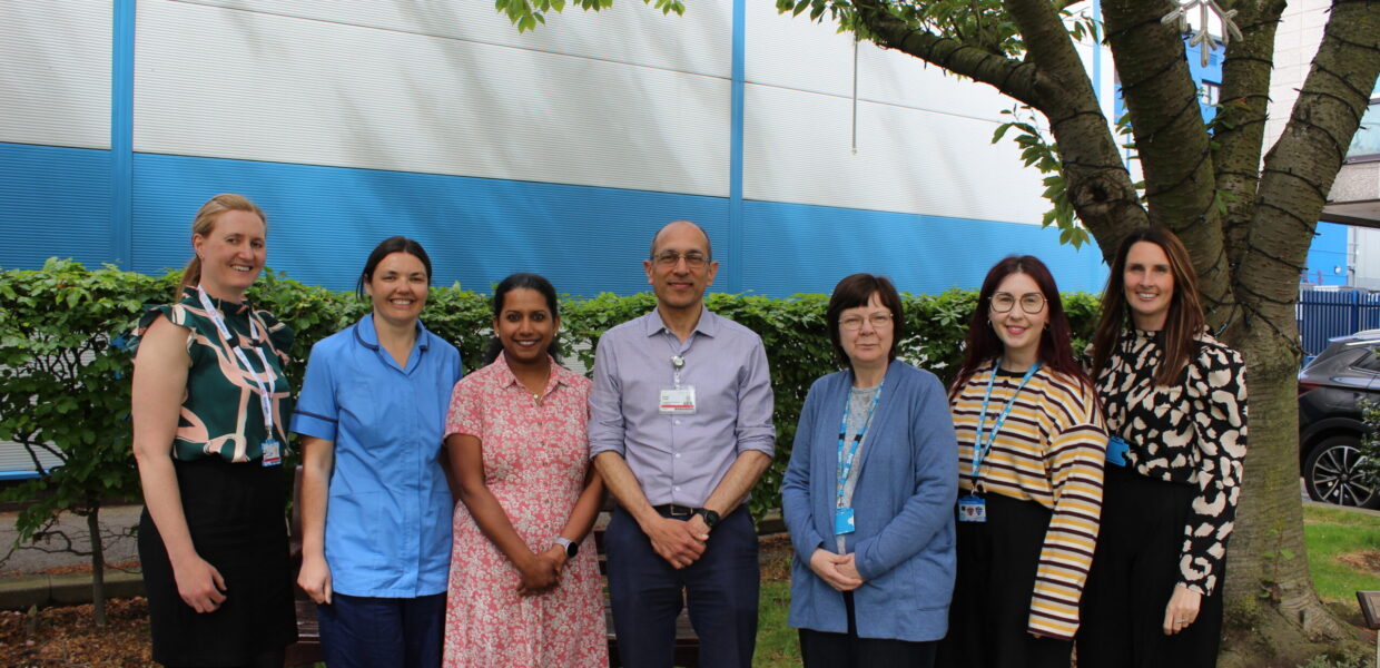 A group of NHS staff pictured outside at a hospital