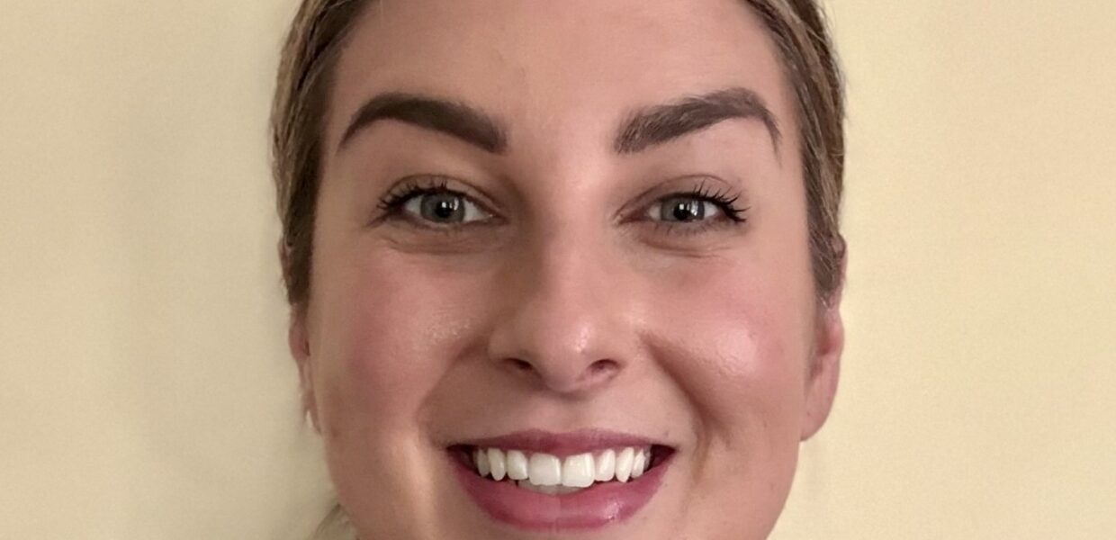 A woman smiling