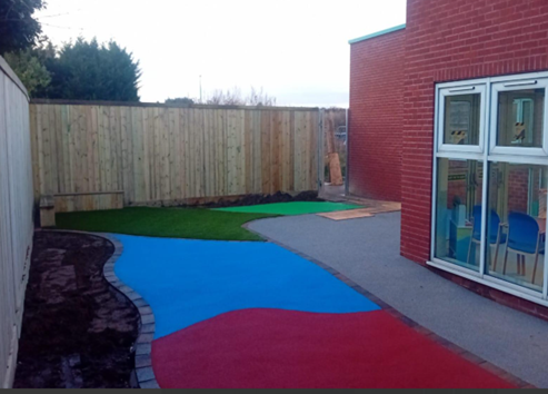 A garden with coloured flooring