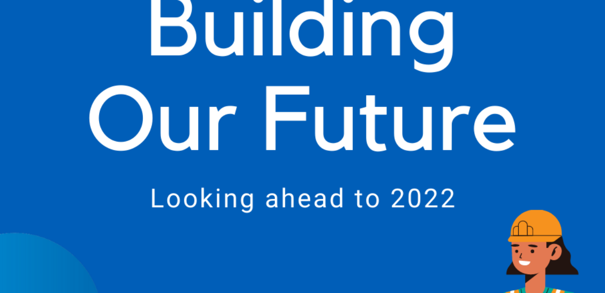 A blue background with a cartoon builder and interlocking blue and grey circles. In the centre is white writing saying "Building Our Future. Looking ahead to 2022"