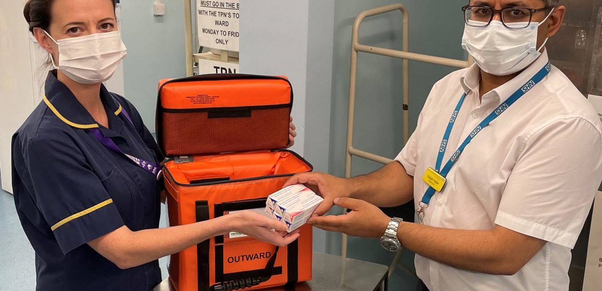 Assistant Chief Pharmacist Paulash Haider delivers the first vaccines to our teams