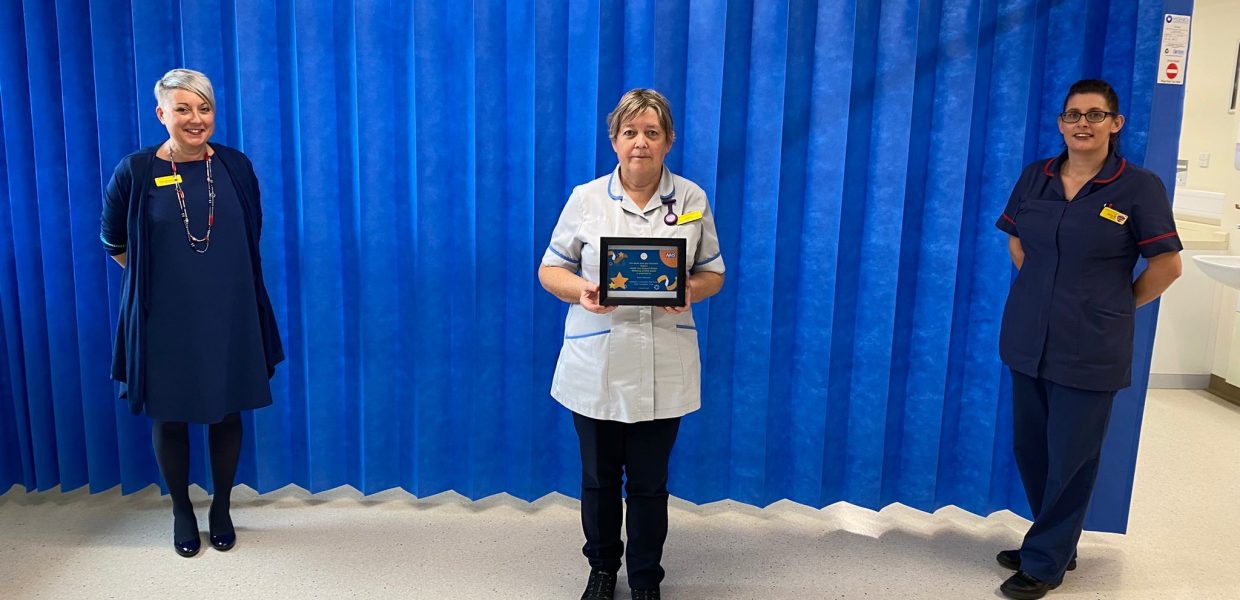 Chief Nurse Ellie Monkhouse and Goole Matron Kerry Owne, present Elaine Ramsden with a certificate